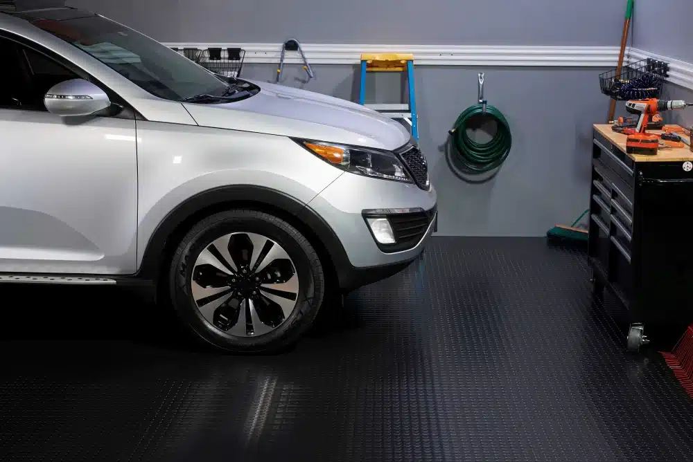 Silver SUV on Midnight Black large Coin texture vinyl flooring