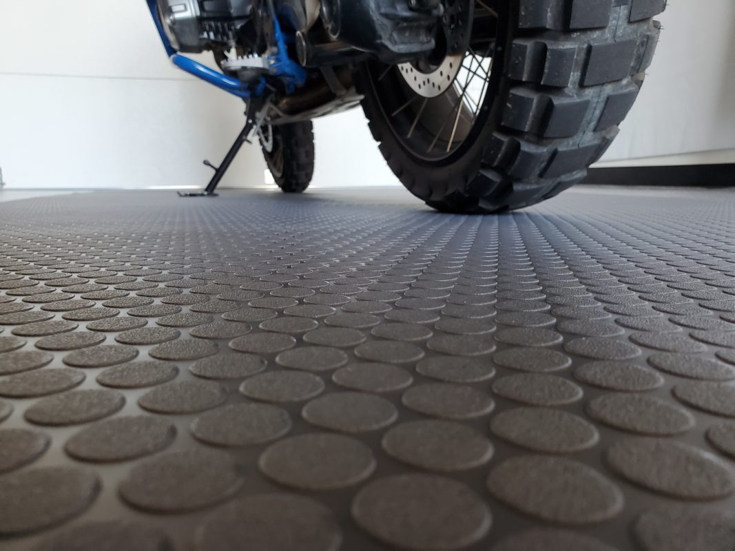 motorcycle on small coin vinyl flooring