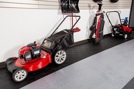 G-Floor runners protection floor from red mower, golf bag, and snow blower