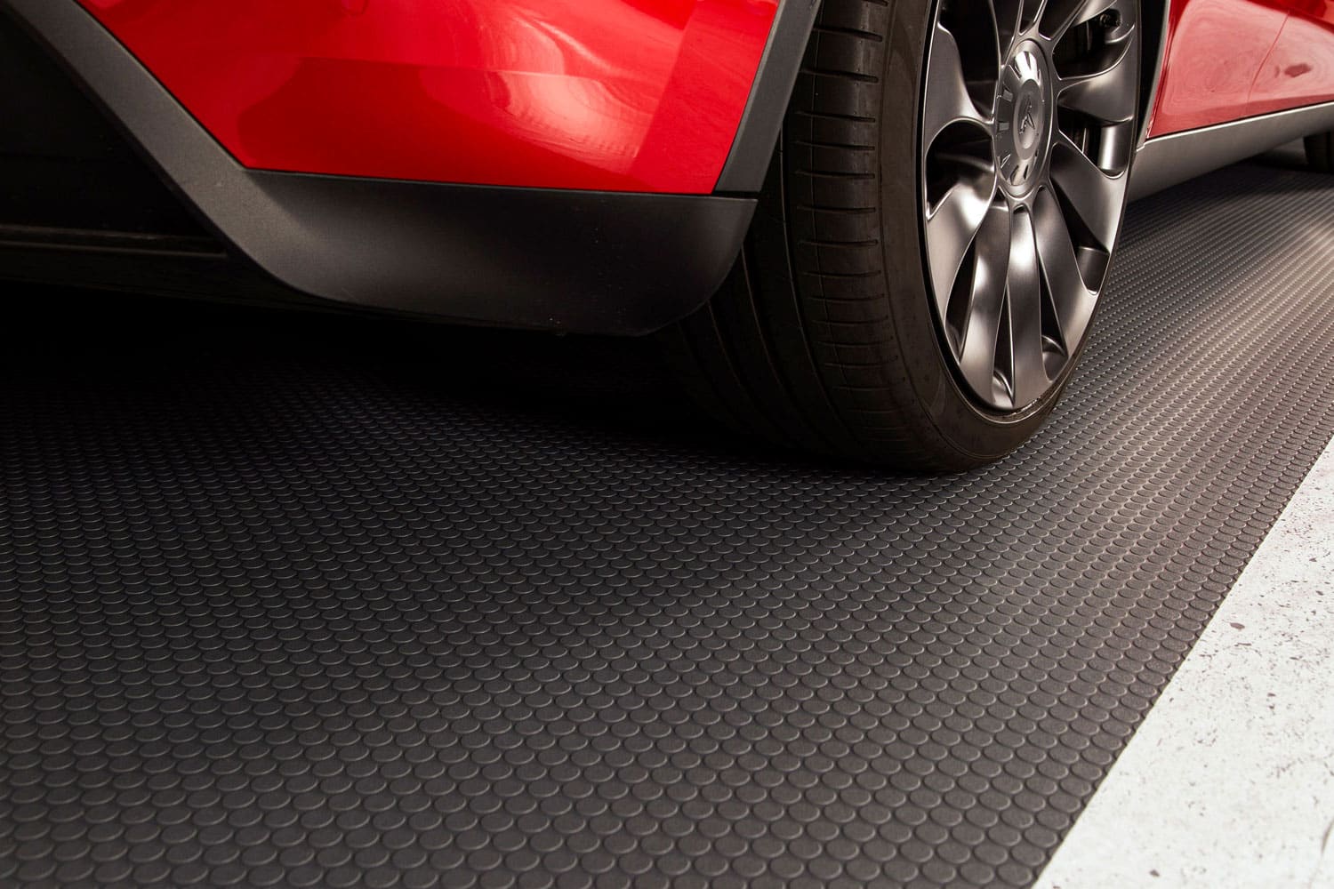 Protect your garage floor with a small coin parking pad from G-Floor