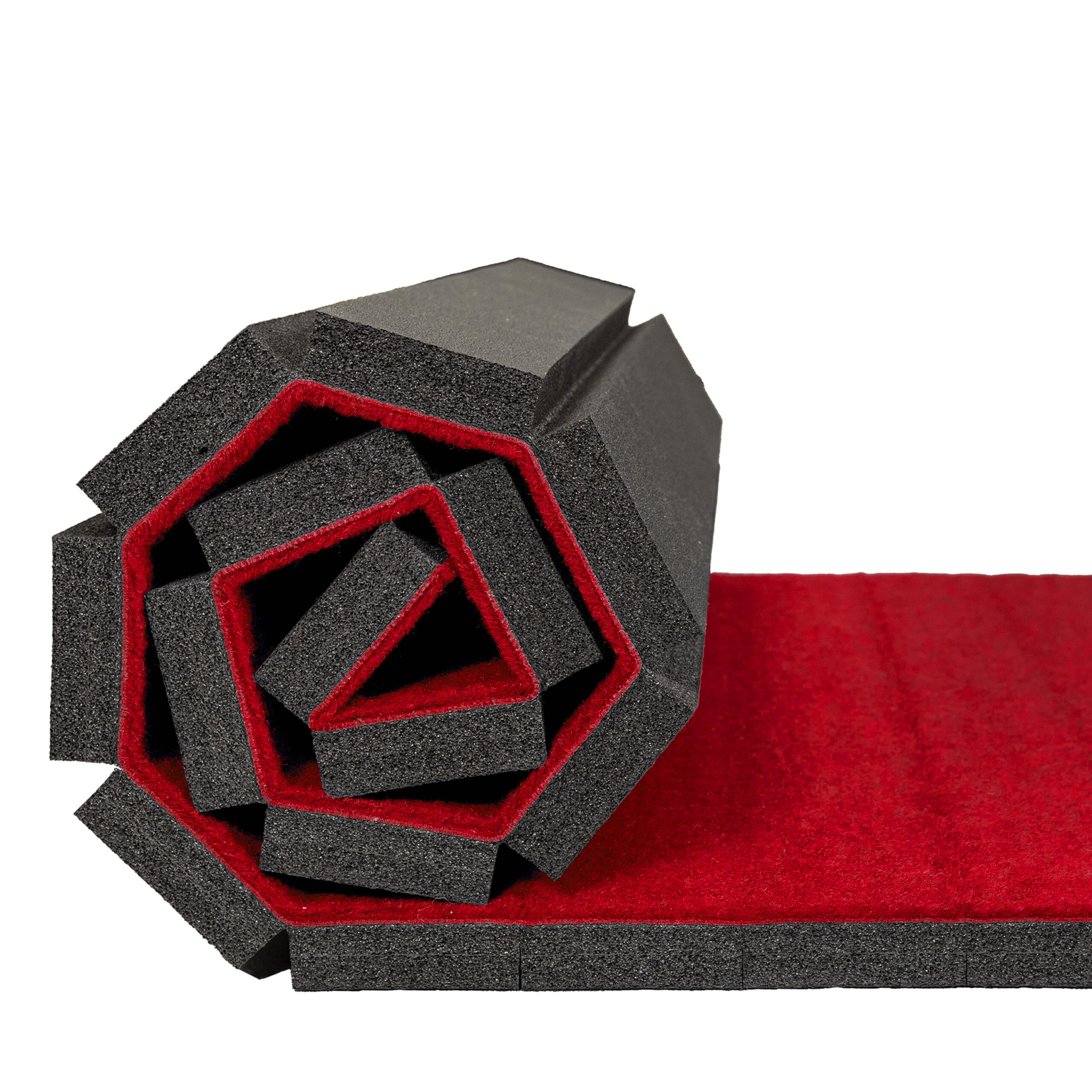Cross-section of rolled red carpet bonded foam flooring with a thick black foam backing.